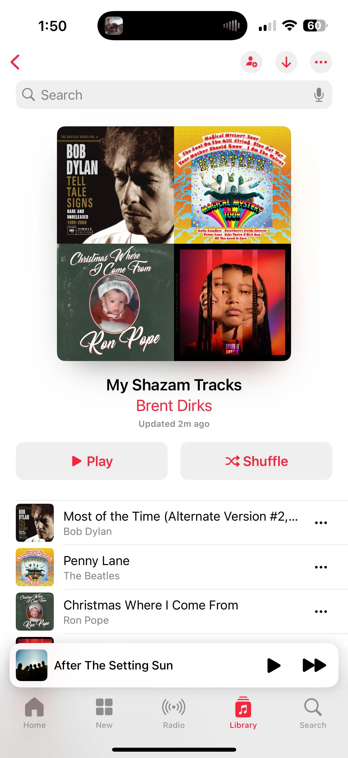 Ảnh chụp màn hình playlist 'My Shazam Tracks' trong ứng dụng Apple Music sau khi đồng bộ với Shazam