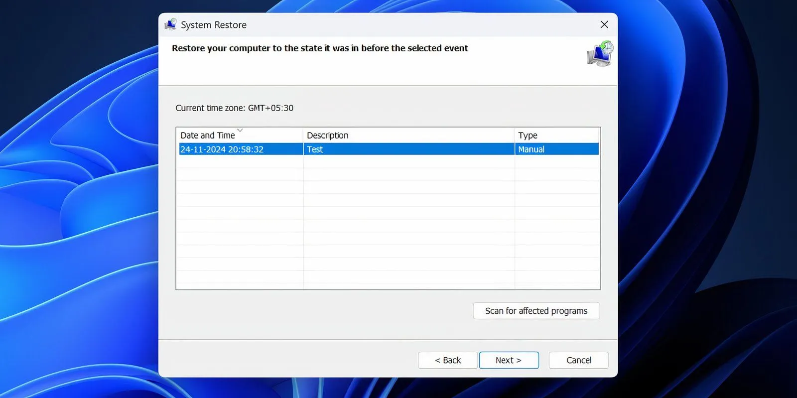 Cửa sổ System Restore hiển thị danh sách các điểm khôi phục để lựa chọn