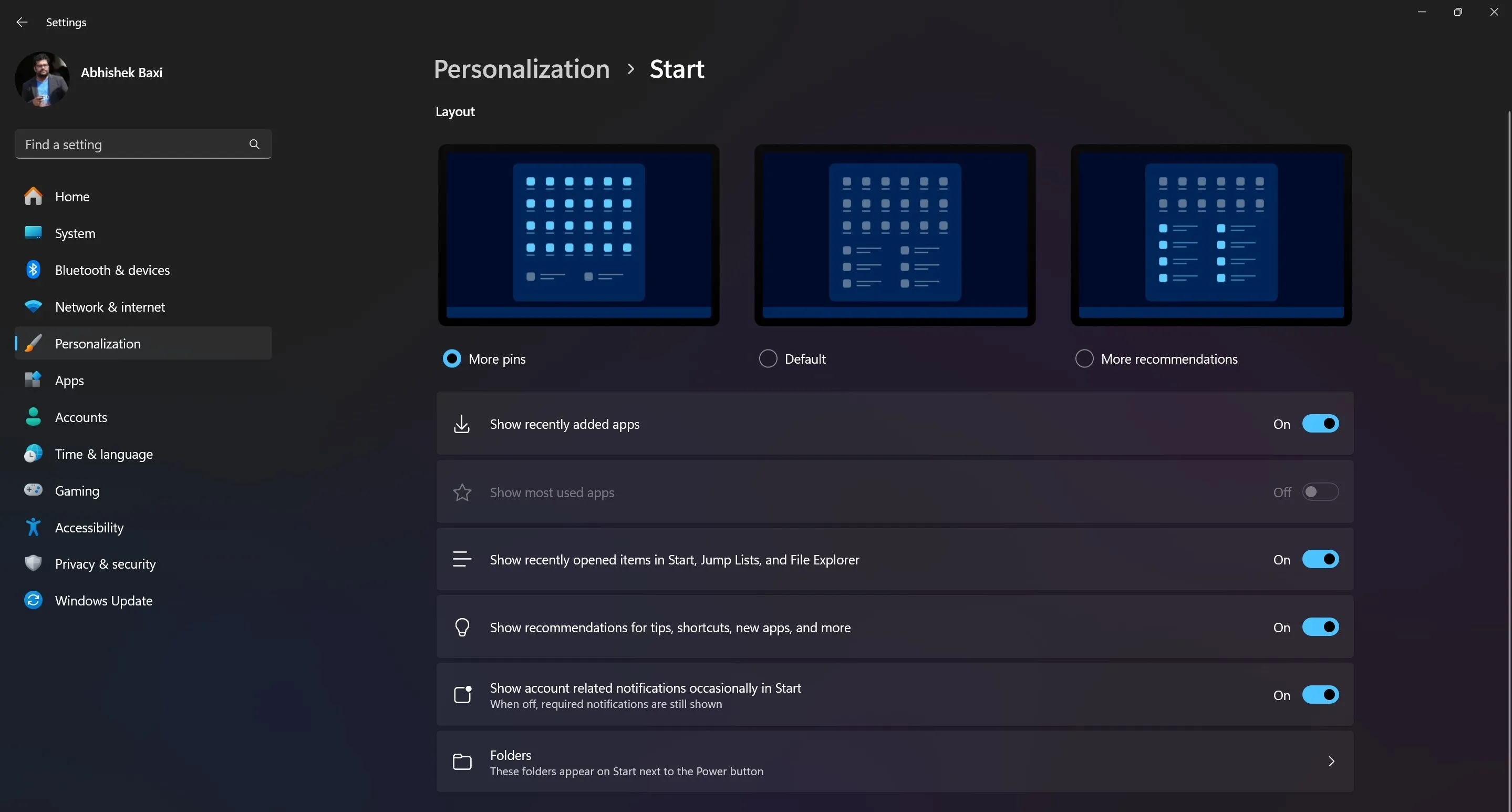 Giao diện cài đặt bố cục Menu Start trên Windows 11, hiển thị các tùy chọn 'Nhiều ứng dụng ghim', 'Mặc định' và 'Nhiều đề xuất'.
