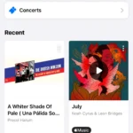 Giao diện chính ứng dụng Shazam trên iPhone hiển thị thư viện nhạc đã nhận diện và biểu tượng Cài đặt