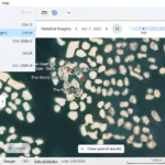 Giao diện Google Earth với tính năng Street View lịch sử, cho phép xem sự thay đổi của một địa điểm qua các năm bằng thanh trượt thời gian.