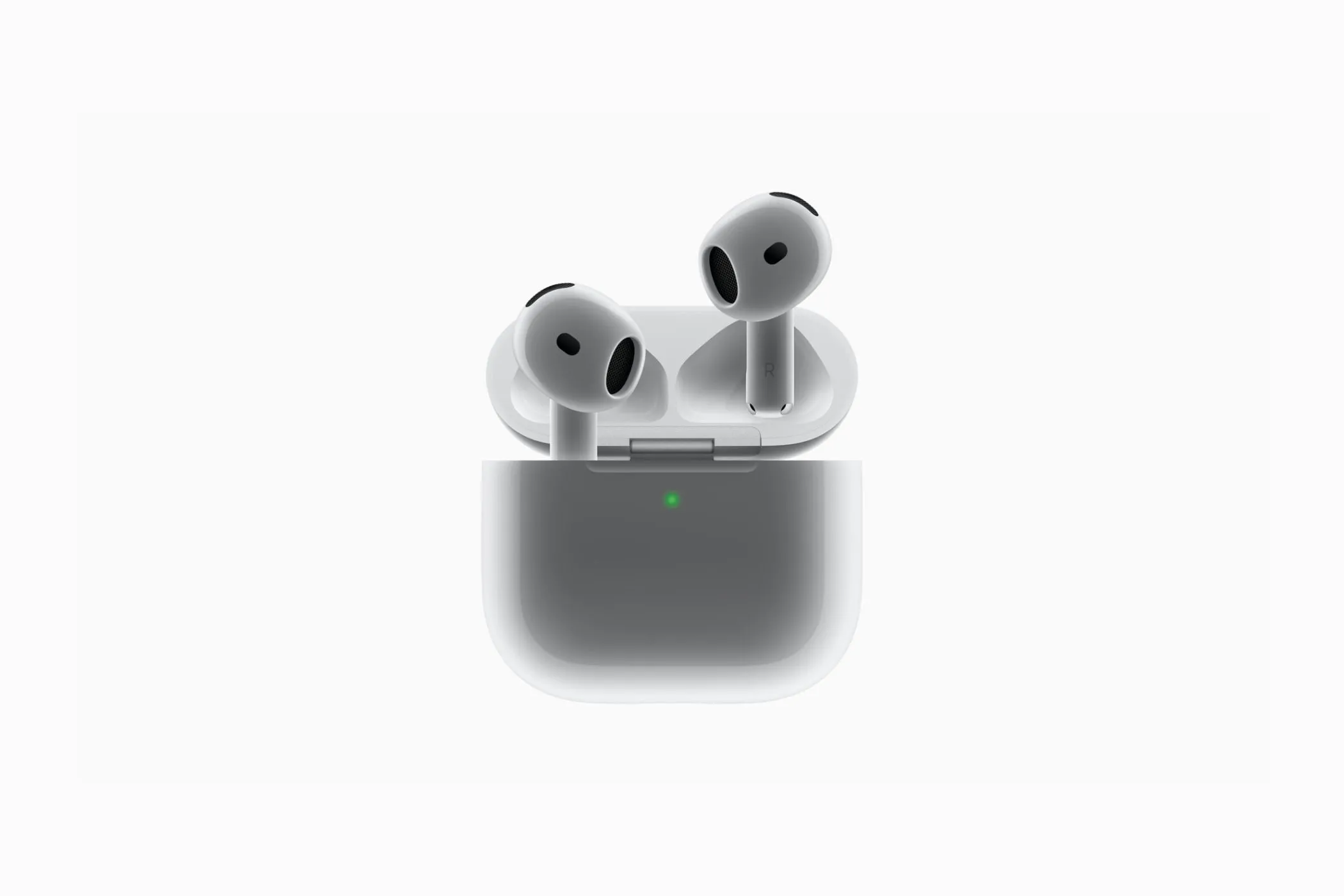 Hộp sạc và tai nghe Apple AirPods 4, nổi bật với kích thước nhỏ gọn hơn AirPods 3 và không có nút ghép nối.
