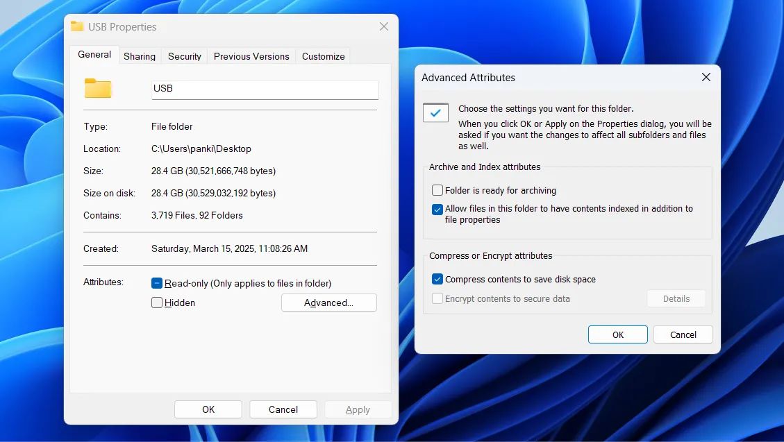 Hộp thoại thuộc tính thư mục (Folder Properties) trong Windows 11 với tùy chọn &quot;Compress contents to save disk space&quot; đã được chọn