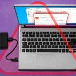 Laptop hiển thị lỗi trên màn hình khi kết nối với ổ đĩa ngoài, minh họa vấn đề tương thích BitLocker.