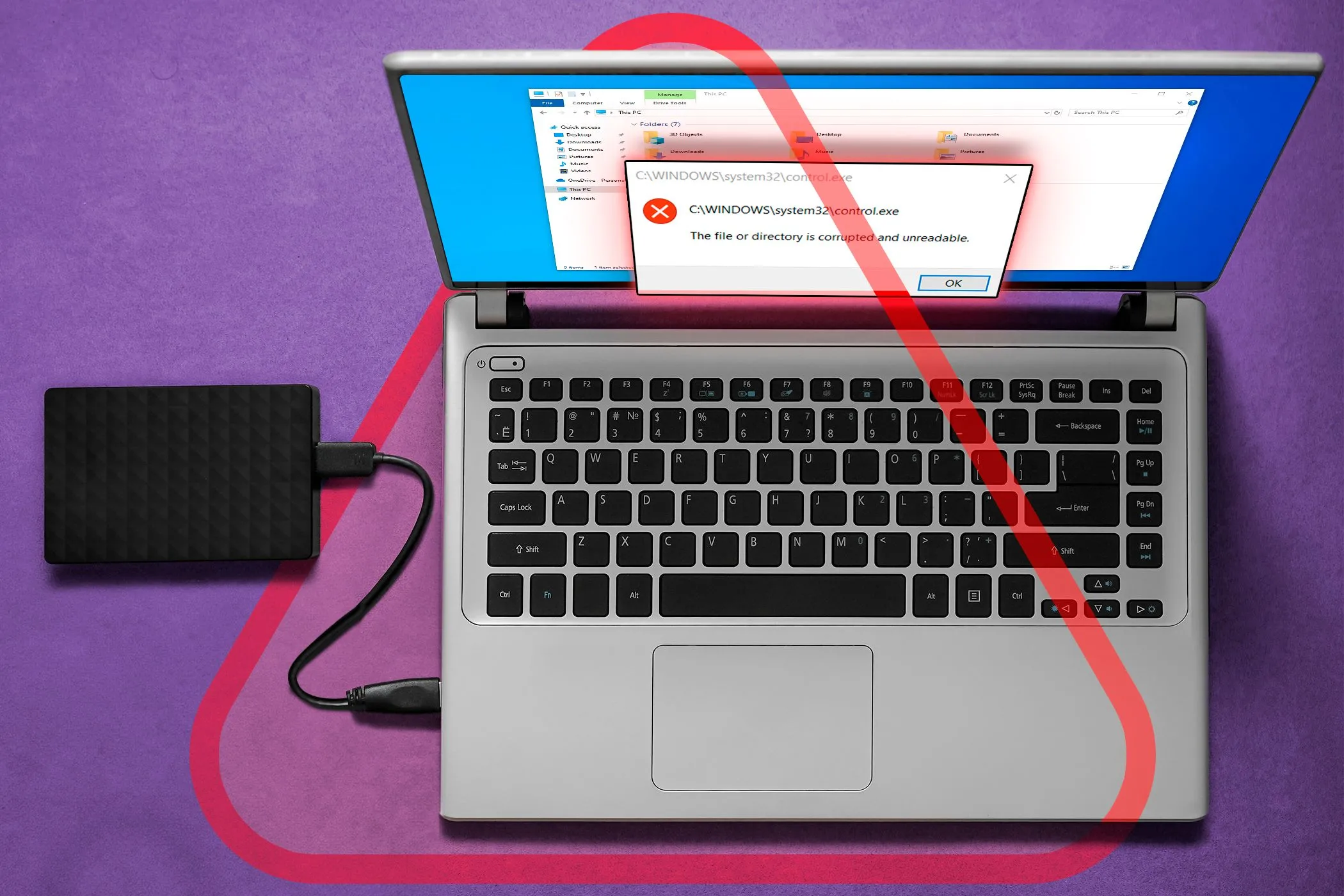 Laptop hiển thị lỗi trên màn hình khi kết nối với ổ đĩa ngoài, minh họa vấn đề tương thích BitLocker.