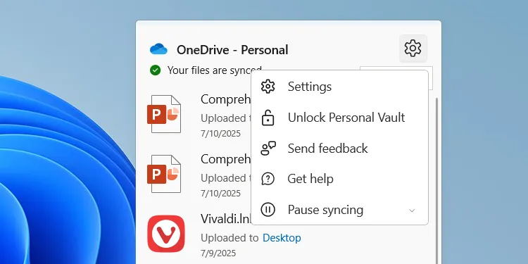 Menu cài đặt OneDrive truy cập từ biểu tượng trên thanh tác vụ Windows 11.