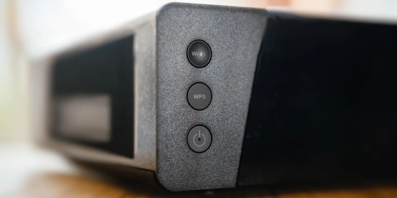 Nút WPS (Wi-Fi Protected Setup) trên thân router