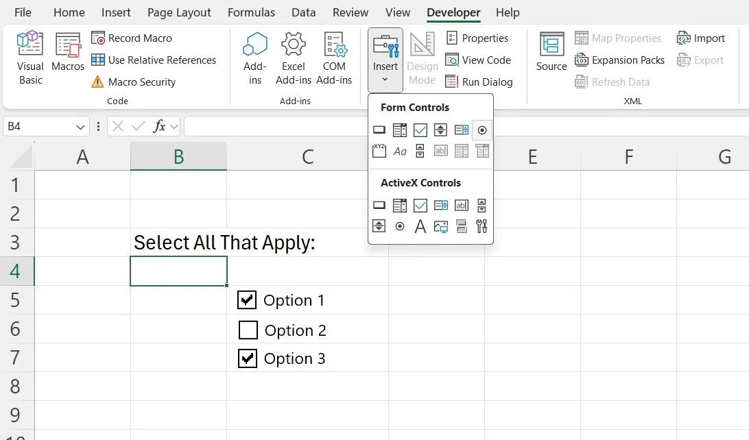 Thẻ Developer trong Microsoft Excel hiển thị các công cụ kiểm soát biểu mẫu, bao gồm các tùy chọn tạo ô kiểm