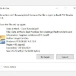 Thông báo lỗi "File in Use" trên Windows 10 khi tệp PDF đang mở, ngăn cản việc xóa.