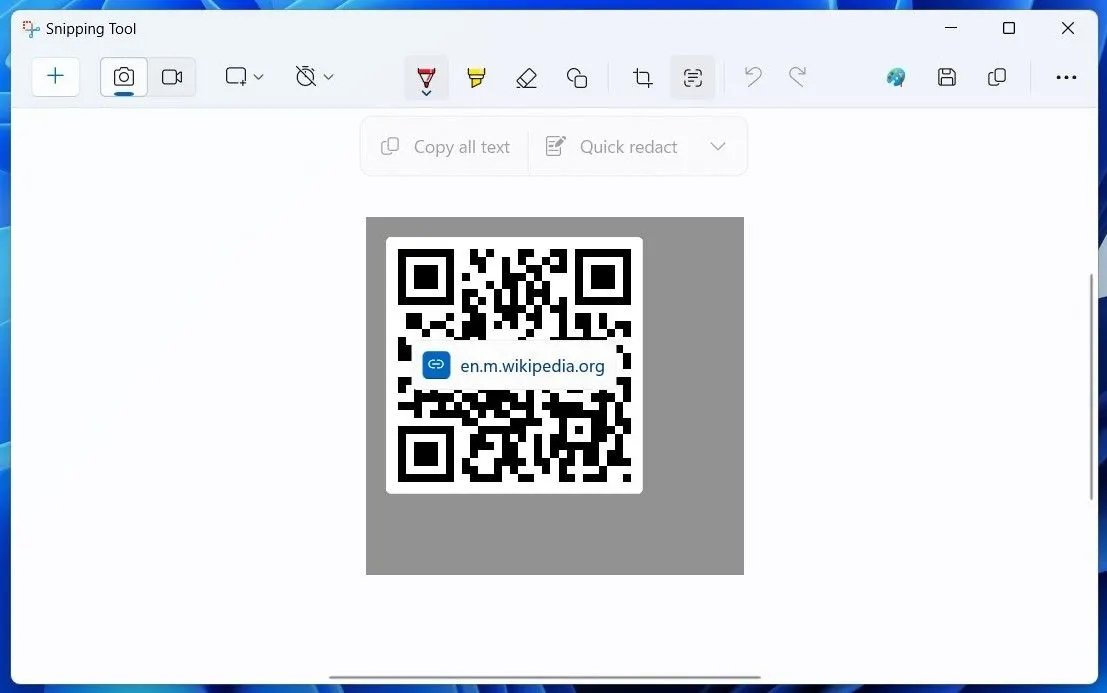Ứng dụng Snipping Tool của Windows 11 đang quét mã QR, hiển thị biểu tượng Text Actions