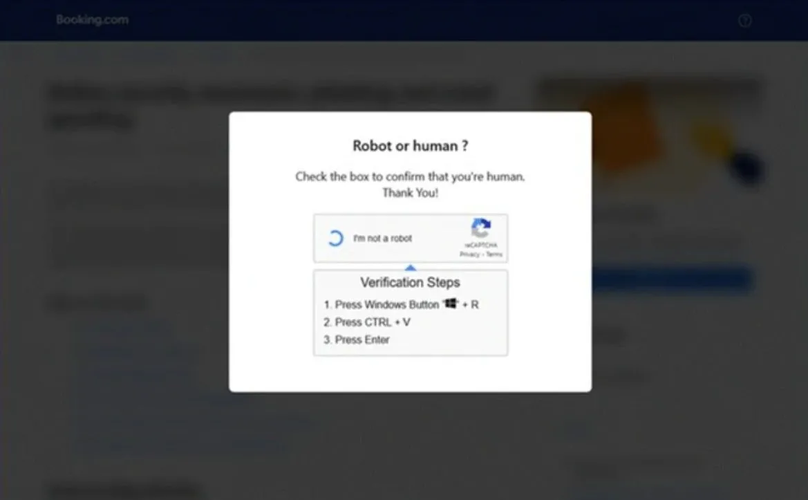 Ví dụ về trang CAPTCHA giả mạo dùng để phát tán mã độc trong chiến dịch phishing Booking.com